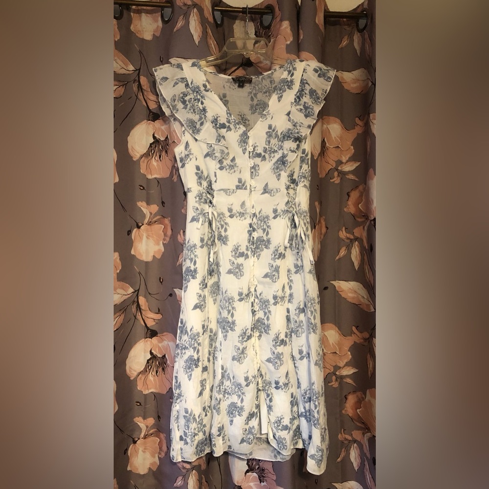 white j gee linen dress with blue floral pattern